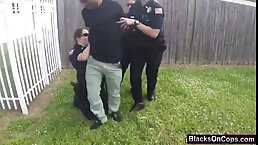 A black felon had a nice threesome with two horny busty cops, while on the street
