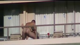 Naked guy got a blowjob on the balcony, during the day and then fucked his girlfriend