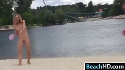 Nude babes are having a lot of fun on the beach, in the middle of the day