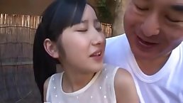 Petite Japanese brunette is sucking her neighbor's dick while others are waiting for blowjobs
