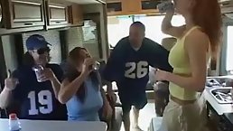 Red haired babe is having group sex with strangers, in their bus, and enjoying it a lot