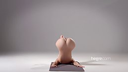 Nude babe is doing yoga in front of the camera, because it excites her a lot