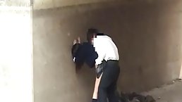 Dark haired, Asian schoolgirl is getting banged in a public place, in the middle of the day