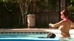 An amateur babe with big tits likes to get fucked next to her swimming pool