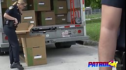 Slutty women in police uniforms are having a threesome while working, and enjoying it a lot