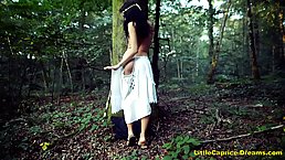 Black haired babe is masturbating in the forest, because it excites her more than anything else