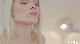 Pretty blonde babe is fingering her soaking wet pussy and stimulating it with a vibrator
