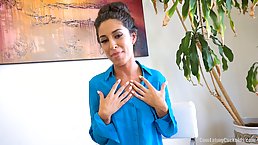Carmen Canela with a tattooed body is here for some showing off and fingering