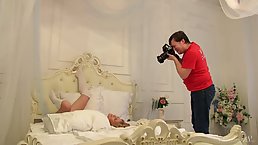Cute blonde bitch, Teresa Tamara is posing naked, while a horny photographer is taking photos