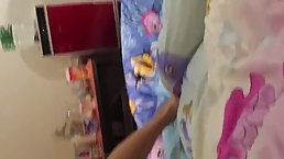 Chinese pregnant girl is lying on the bed and spreading her hairy pussy, like a real whore
