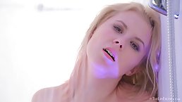 Blonde babe is fingering her hairy pussy and moaning from pleasure while experiencing an orgasm