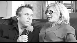 Married blonde woman in black lingerie and garter belt, Nina Hartley is fucking her new lover