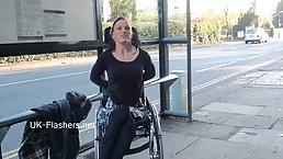 Kinky babe in a wheelchair likes to spread her legs wide, and show her pussy