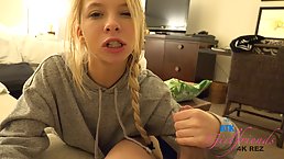 Kenzie Reeves is gently rubbing her partner's dick with her soft feet to make him cum
