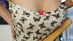 Naughty blonde lady does not mind that we can see her tits while she is posing