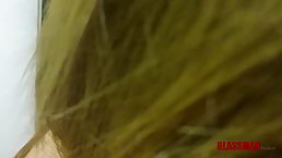 Cock loving chick is kneeling in her office and sucking her colleague's rock hard cock