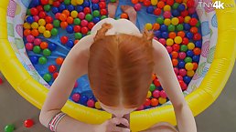 Nasty redhead is down on her knees and drooling on her horny guy’s thick meat stick
