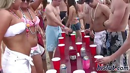Busty ladies are having casual sex sessions with random, handsome guys during a beach party