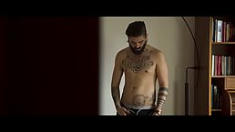 Two guys are fucking one tattooed girl at the same time, and enjoying it a lot