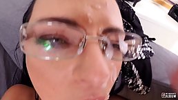 Dark haired slut with glasses is getting her face jizzed with sticky cum after a good fuck