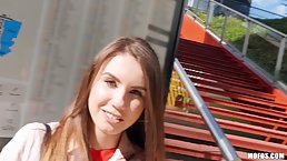 Cute babe, Elle Rose is kneeling and sucking a horny stranger’s big dick, in a public place
