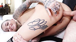 Tattooed chick with short hair, Leigh Raven likes to suck dick and get it up her ass