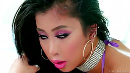Asian brunette is giving hot titjobs to guys she likes and listening to their moans and sighs