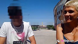 Vivi Sevilla is kneeling in front of a guy she has just met and sucking his cock