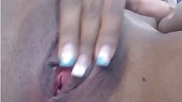 Latin bombshell is showing us her massive boobs and a perfectly shaved pussy in a hot close- up