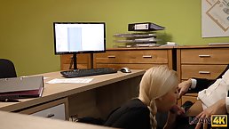 A horny boss and a naughty secretary in high heels are fucking, while in the office