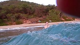 Delightful, red haired girl likes to be naked on the beach and to suck a stranger's dick