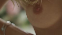 Perfect blonde babe with nice boobs is posing and teasing, because it feels so good