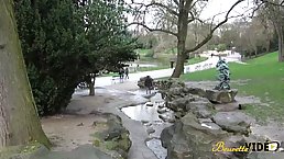 Petite teen brunette with small tits, Shirina is kneeling and sucking two rock hard dicks