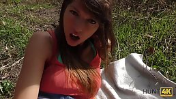 Small titted babe is getting fucked during the day, in a doggy position, in the nature