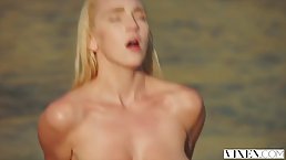 Hot, blonde babe with big tits is about to get fucked hard, on the beach