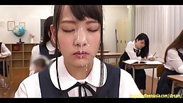 Abe Mikako is getting fresh cum all over her face from guys who are jerking off