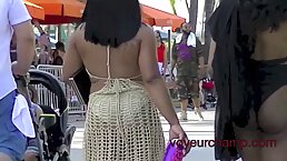 Experienced voyeur is secretly making videos of nice, round asses in the street, during the day
