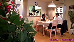 Slutty Japanese schoolgirl is kneeling while sucking cock, because her partner likes it like that