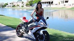 Skinny teen in a red dress, Scarlet Chicagoon is drilling her tight pussy with a huge dildo