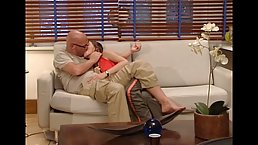Young bitch is having steamy sex with an elderly man, while his wife is at work