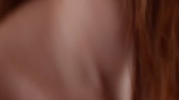 Amazing, red haired babe with tiny tits is gently touching her pussy in front of the camera