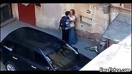 Horny amateur couple was caught on tape while they were making out in the street