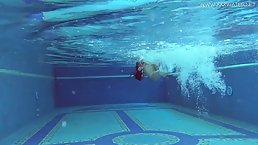 Latin babe took off her bikini in the swimming pool and started touching herself