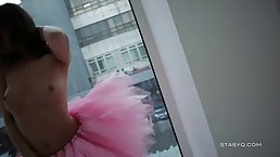 Russian ballerina is wearing a pink tutu skirt and showing us that she has no panties