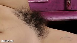 Hairy teen brunette with pale skin, Ole Nina is spreading up and displaying her bush