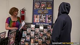 Nasty woman with ample assets, Sara Jay sucked a black cock through a gloryhole and fucked it