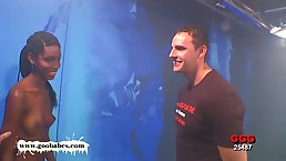 Gorgeous, ebony chick in a sexy dress, Zara is getting hammered on the stage and eating cum