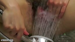 Veronika is a big titted chick who likes to masturbate in the shower and display her bush