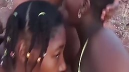 African people are having group sex in the nature, in the middle of the day