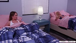 Brunette with big tits is facesitting her lesbian friend, while they are naked in the bedroom